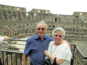 Brantford couple Reid and Debbie Bean - pictured here at the Colosseum in Rome -- won the trip of a lifetime when Reid bought a new pair of glasses last year. (Submitted Photo)