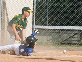 The Stony Plain mosquito Double A Royals (blue jersey) shown here in action against Sherwood Park, will be looking at scoring plenty of runs this weekend in hopes of earning a gold medal at the provincial championships in Stony. - Gord Montgomery, Reporter/Examiner