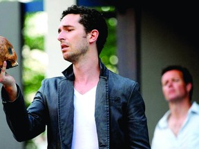 Eric Craig, as Hamlet, performs the "Alas, poor Yorick" scene, while David Snelgrove looks on as Horatio in the St. Lawrence Shakespeare Festival's production of 'Hamlet', performed in Prescott over the summer of 2013(SUBMITTED PHOTO).