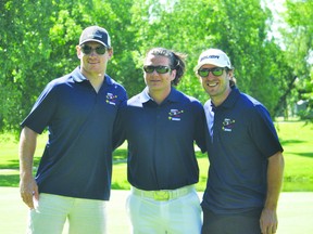 Cody McLeod, Arron Asham and Mike Richards pose during Asham's Chance 2 Play Golf Tournament July 19, sponsored by Scotiabank. (Kevin Hirschfield/THE GRAPHIC/QMI AGENCY)
