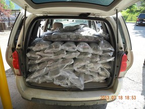 An RCMP photo of the inside of mini van where approximately 300 pounds of marijuana and three kilograms of ecstasy were found during a traffic infraction stop along the Trans-Canada Highway near Canmore on Thursday, July 18, 2013. Supplied photo