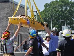 A man fell into a six metres (20-foot) deep empty concrete water tank at the Brockville water pollution control centre on Friday morning, requiring Leeds Grenville EMS paramedics and Brockville and Elizabethtown-Kitley firefighters to lift him out for treatment. (DARCY CHEEK The Recorder and Times)