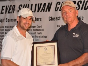 Steve Sullivan poses with Timmins’ mayor Tom Laughren after being honoured with a plaque prior to the start of last year’s 22nd annual Lever/Sullivan Classic Invitational Golf Tournament at the Hollinger Golf Club. This year’s got underway Friday with a practice round with more than 200 golfers making up 108 teams.