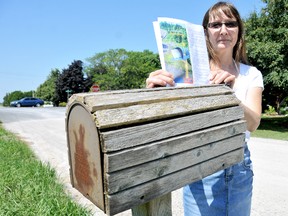 Jackie Girard is upset Canada Post has told her she will have to move her mailbox further down Claymore Line away from St. Clair Road. Canada Post said the change in mailbox locations are to ensure letter carrier safety. Diana Martin/Chatham Daily News/QMI Agency