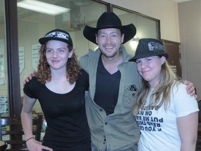 Paul Brandt stopped by the Nanton evacuation centre at the Tom Hornecker Recreation Centre on June 26, asking evacuees what he could do to help.