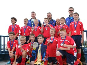 The Beaumont FC U12 soccer team snagged silver at the Moon Day Tournament on July 12-14. Coach Tim Carson said he was happy with his team’s results considering it was their first year playing as a competitive team. (submitted photo)