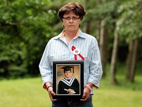 Sheri Arsenault holds a photo of her son Bradley Arsenault, who was killed on Nov. 26, 2011 by an alleged drunk driver. Arsenault recently met with Justice Minister Peter MacKay to discuss victim's rights. (David Bloom/QMI Agency)