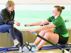 Trent University rower Sarah Rothwell, of Listowel, trains with coach Carol Love at Trent's Athletic Centre in Peterborough this spring. Rothwell, a Row To The Podium athlete, is competing Sunday in the finals at the world Under-23 championships in Austria next week. Clifford Skarstedt/Peterborough Examiner/QMI Agency file photo