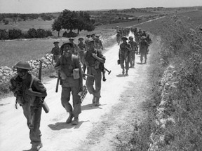 The 2nd Seaforth Highlanders advance through Sicily during the long march inland on July 11, 1943.