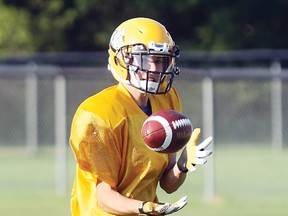 North Bay Jr. Varsity Bulldogs receiver Aaron McCormick hauls in a pass during practice Thursday at Rollie Fischer Field. The Bulldogs host the Oshawa Hawkeyes today in their OVFL regular season finale at Steve Omischl Sports Field Complex at 5 p.m.