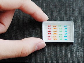 Meat-packing plants use these "cassette" components, which are a little larger than a postage stamp, to take liquid batch samples. Over the past 15 years, a research team at the University of Alberta has been working on a cheap, accurate and fast way to detect E. coli in meat. PHOTO SUPPLIED