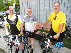Mark Miller of London, Benty Rowe of London and Mel Head of Ancaster rested at the Delhi Community Arena Saturday afternoon after completing the Tour de Norfolk. (SARAH DOKTOR Simcoe Reformer)