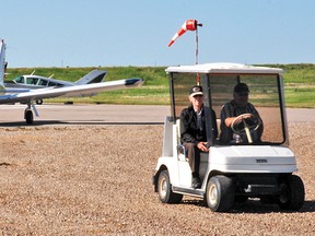 A pilot gets taxied in to the Vulcan Airport on Sunday, July 21, during the 38th annual Fly-In Breakfast, which was hosted by the Vulcan Flying Club with help from the Vulcan Airport Committee and the Vulcan Lions Club.