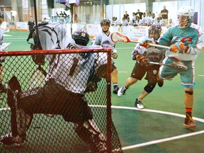 Craig Point of the Chiefs is denied by Kodiaks goalie Dillon Ward on  Sunday in Major Series Lacrosse action at the Iroquois Lacrosse Arena. (DARRYL G. SMART, QMI Agency)