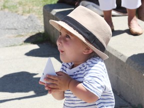 Robert Marignoni, 2, keeps a butterfly warm prior to releasing it at the Kia Butterflies and Memories live butterfly release at Fielding Memorial Park in Lively on Sunday, July 21, 2013. See video at www.thesudburystar.com JOHN LAPPA/THE SUDBURY STAR/QMI AGENCY