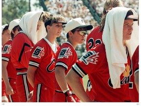 The Canadian women's softball team looks on from the dugout during the 1996 Olympics in Atlanta, Georgia. Softball is a candidate to return to the Olympic lineup for 2020. File photo