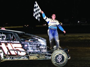 HENRY HANNEWYK photo
Stephane LaFrance celebrates his first BOS 358 Modified feature win of the season.