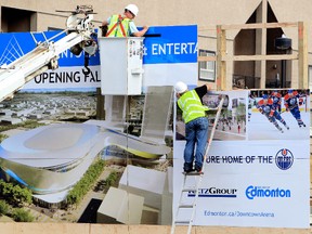 Crews work to set up a sign promoting the downtown arena project at the corner of 104 Street and 104 Avenue, in Edmonton, Alta., Monday July 22, 2013. David Bloom/Edmonton Sun/QMI Agency