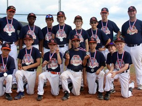 The Pee Wee AA Oil Giants pose with their silver medals after losing to the Elk Point Sox in the finals of the Tier V provincial championship.