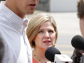 NDP candidate Adam Giambrone and leader Andrea Horwath in Scarborough July 11, 2013. (Keaton Robbins/Toronto Sun)
