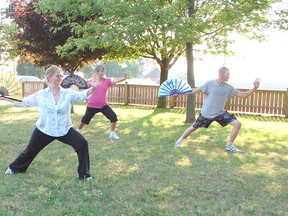 Carol O'Connor of Kincardine teaches Single Flying Rainbow Fan, a form of Tai Chi, on July 15, 2013. (ALANNA RICE/KINCARDINE NEWS)