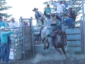 Sheena Read Editor
Chase Keeley is seen here about to take a no score in the saddle bronc riding at the Nanton Nite Rodeo on Friday. Keeley is one of the top rodeo athletes competing in the Canadian high school rodeo finals this week at the Nanton Agri-Park.