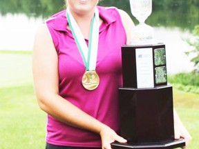 Robyn Doig holds the Marlene Streit trophy after winning the Ontario Women’s Amateur tournament in Tottenham last week.