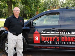 A Buyers Choice Home Inspection Quinte owner, Ken Jackett, stands with his company vehicle at his home in Belleville.