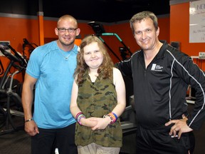 Fit Effect owner Nick Hayward, 16-year-old Courteney with Rett Syndrome and her father Darcy Balak, secretary for the Ontario Rett Syndrome Association, are organizing the Neuro-palooza concert in Paris on July 27 to raise funds for both ALS and Rett Syndrome. MICHAEL PEELING/The Paris Star/QMI Agency