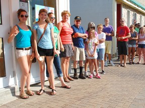 The Kincardine Dairy Queen opened its doors July 18, 2013 to a hungry crowd. A patient crowd waits outside for the opening at 9 a.m. (ALANNA RICE/KINCARDINE NEWS)