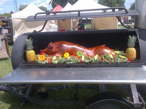 The McLay brothers prize winning hog. Flint and Randy McLay earned entrance into a the World Food Championships at a competition in New Hamburg.  (Submitted photo)