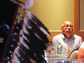 The now former chair of the Treaty Three Police board, Wayne Smith, sits at his table at the police force's AGM on Tuesday, July 23, just hours before stepping down.
