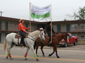 These riders representing the Fairview Agricultural Society led the parade on its way down Main Street in Fairview on Saturday morning. The parade was a bit shorter than in previous years but it still gave viewers a bit of a thrill and a reason to head down to the Waterhole rodeo grounds when the parade was over.