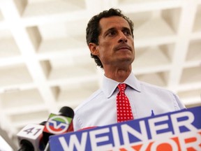 New York mayoral candidate Anthony Weiner attends a news conference in New York July 23, 2013. Weiner, with his wife by his side, said he is staying in the race after confirming on Tuesday that some newly revealed sexually explicit online chats and photos, published this week by a gossip website, were sent by him. REUTERS/Eric Thayer