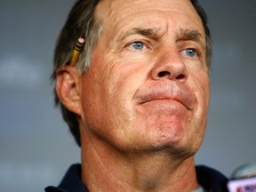 New England Patriots head coach Bill Belichick addresses the media regarding the criminal charges against Aaron Hernandez in Foxboro, Massachusetts, July 24, 2013. (REUTERS)