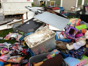 PHOTO COURTESY OF ROWAN HOUSE EMERGENCY SHELTER. Despite dealing with a massive clean up, Rowan House staff are inviting residents to their one year anniversary celebration at the Okotoks Dawgs game July 26.