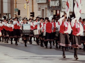 During its heyday in the '70s, the St. John's Drum and Bugle Corps was a popular part of parades all over southern Ontario. In 1978, the group marches through Brantford's downtown wearing new red uniforms. (Submitted Photo)