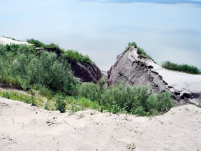 This cliff overlooks Lake Erie near where emergency workers arrived Tuesday to rescue two teenagers on an ATV who fell into a washout, a witness said. The teenagers suffered minor injuries in the incident.