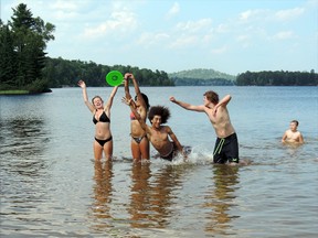 A perfect way to cool off from the hot weather by making a big splash at the beach. Brooklyn Lauzon, Daneen Maher, Terence Murray and Lucas Lachance. 
Photo by Jeana Peltier/For the Mid-North Monitor