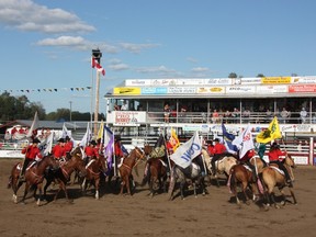 Every year, about 16 local youth from the High Prairie and area, train together for a few months to put on a show at the rodeo. They participate in the parade through town carrying all the major sponsor flags. Every day, during the rodeo they give an opening and closing show for the public. (Louise Liebenberg/Special to Peace Country Sun)