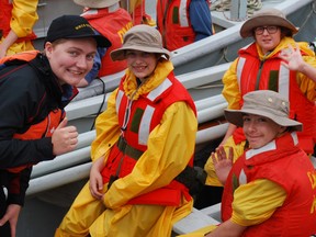 Civilian instructor Caroline Forde prepares Timmins Sea Cadets Sarah Currington and Mickey Fletcher for a day of sailing. The cadets were at HMCS Ontario Cadet Summer Training Centre in Kingston, taking part in the two-week General Training course.