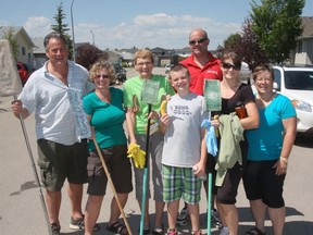 Members of the congregation of the St. Andrew’s United Church were in High River, last Saturday helping to clean homes hit hard by the flood. From left are Gary and Carol Webb, Sandra Brinson, Connall MacLeod, Dan Paarsmarkt and Billy MacLeod.