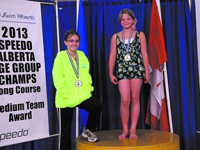 Silver Tide swimmer Anica Kulas displays her gold medal from the recent provincial championships in Edmonton. Photo supplied