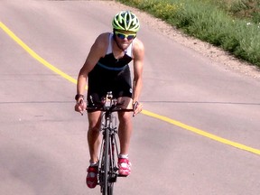 Devon Wittig trains on the bike in Belwood prior to finishing second overall against more than 170 other athletes. He is preparing for the Duathlon (run and bike) World Championship in Ottawa, Aug. 10 and the World Triathlon (swim, bike and run) Championships in London, England, Sept. 11 to 15.