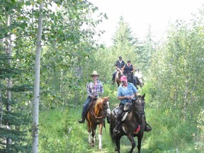 Brenda Hird, Meagan Petty, Charlotte Petty, Logan Petty and Russ Kalika take part in the first Shining Bank Trail Ride for the Cure in 2012.
Submitted