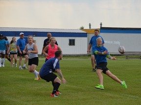 Jenn Kish (right) was on hand to pass on some helpful advice to the Parkland Sharks U19 women’s rugby side at a recent practice in Stony Plain. - Thomas Miller, Reporter/Examiner