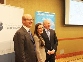 Don Scott, MLA for Fort McMurray-Conklin (L), Mayor Melissa Blake (C) and Alberta Energy Minister Ken Hughes (R) were all smiles as they posed for a photo after Thursday’s announcement that the province will be releasing 55,000 acres of land to the Regional Municipality of Wood Buffalo over the next five to 15 years.   ANDREW BATES/TODAY STAFF