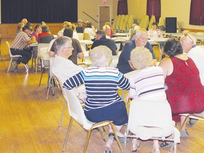 Allumette Island residents discuss the pros and cons of  the amalgamation of Pontiac County municipalities during a public information meeting held Thursday night in Chapeau’s Harrington Hall. This is the last of a series of public consultations on the matter.