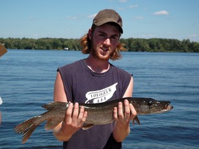 Nick Ethier shows off the large pike that he caught during the Westmeath and District Kids, Parents and Family Fishing Derby.