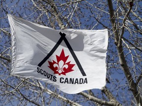 A flag waves outside the Scouts Canada Service Centre in Calgary on March 30, 2011. (LYLE ASPINALL/ QMI AGENCY)